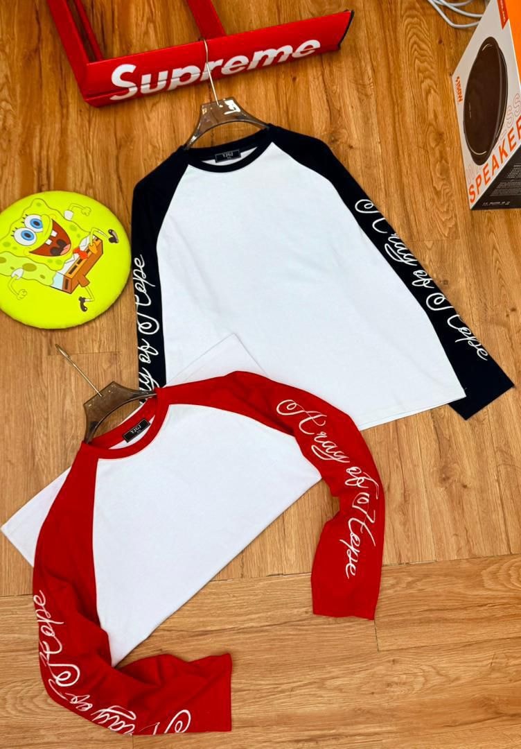 Red and black sleeve Cape raglan long sleeve tees flat lay with Supreme box and accessories.