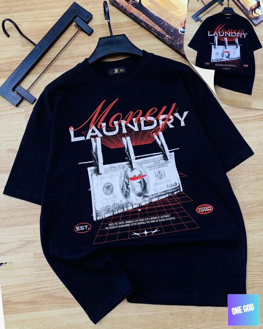 Black Money Laundry graphic tee on hanger and flat lay.