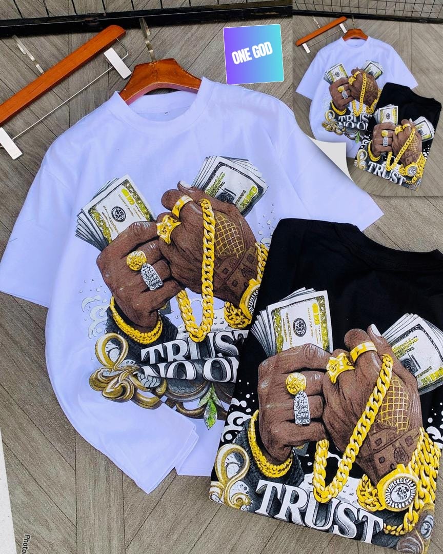 White and black Trust graphic t-shirts showing hands with money, chains, multiple angles.